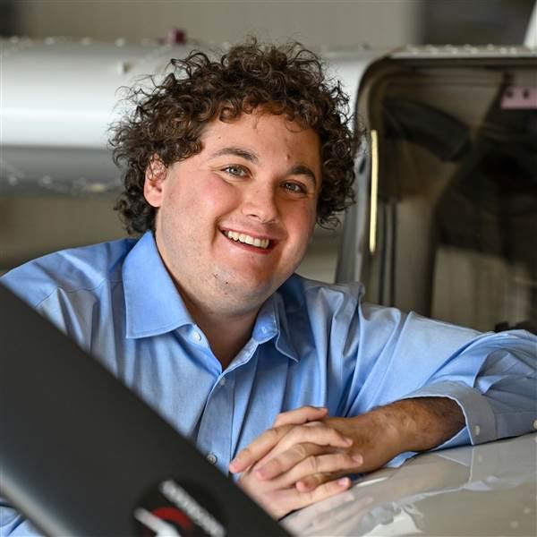 AOPA employee and manager of the AOPA Flying Clubs Initiative Jason Levine, an active CFI, poses for a portrait in Frederick, Maryland, December 5, 2024. Photo by David Tulis.